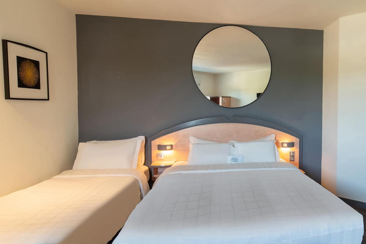 Standard Room, Multiple Beds | Memory-foam beds, desk, blackout curtains, soundproofing