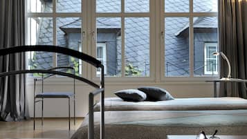 Doppelzimmer | Minibar, Zimmersafe, individuell dekoriert, individuell eingerichtet