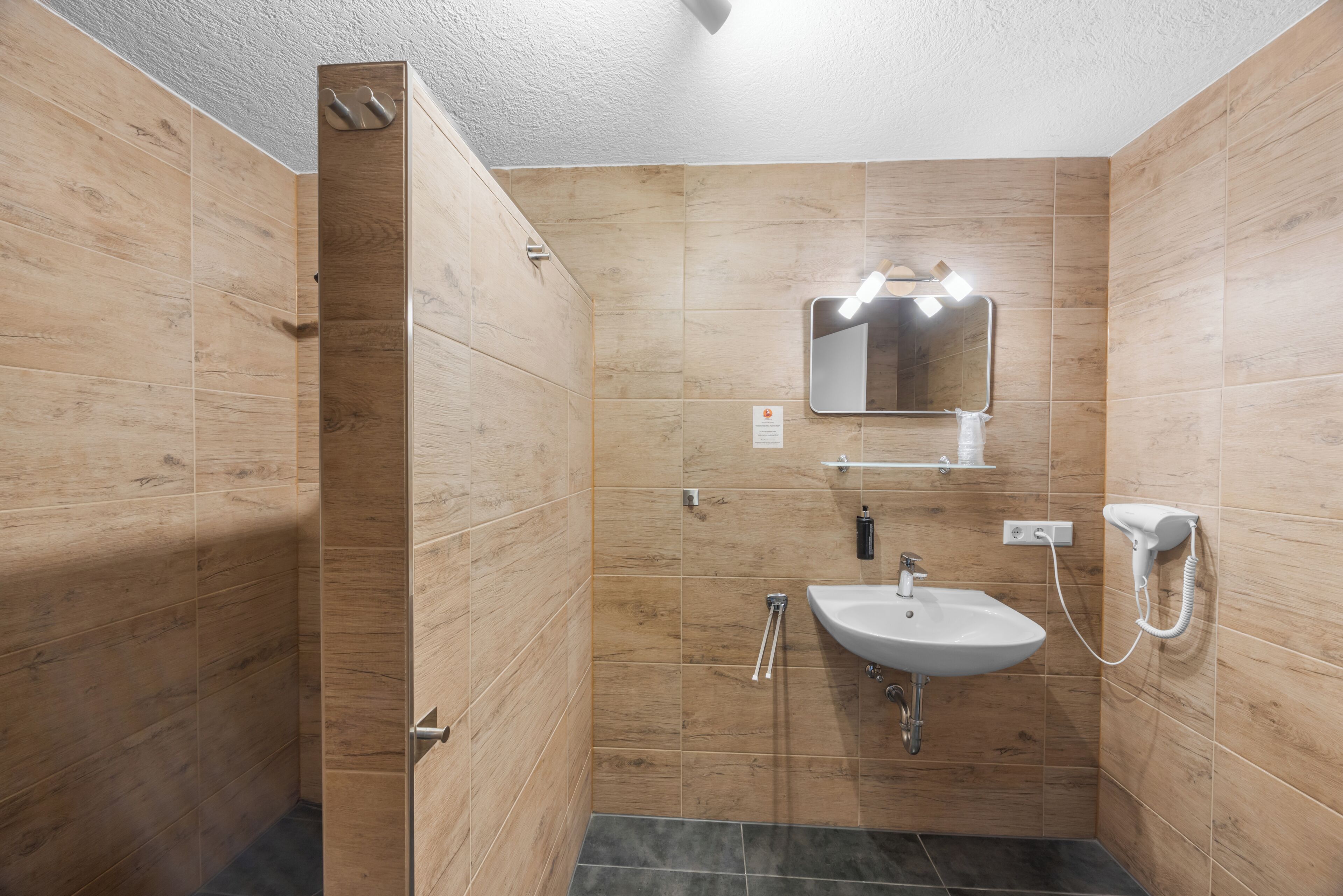 Apartment, 2 Bedrooms | Bathroom | Shower, deep soaking tub, hair dryer, towels