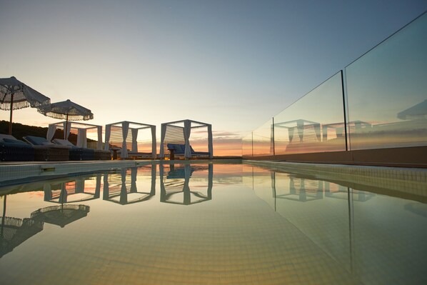 2 outdoor pools, pool umbrellas, sun loungers