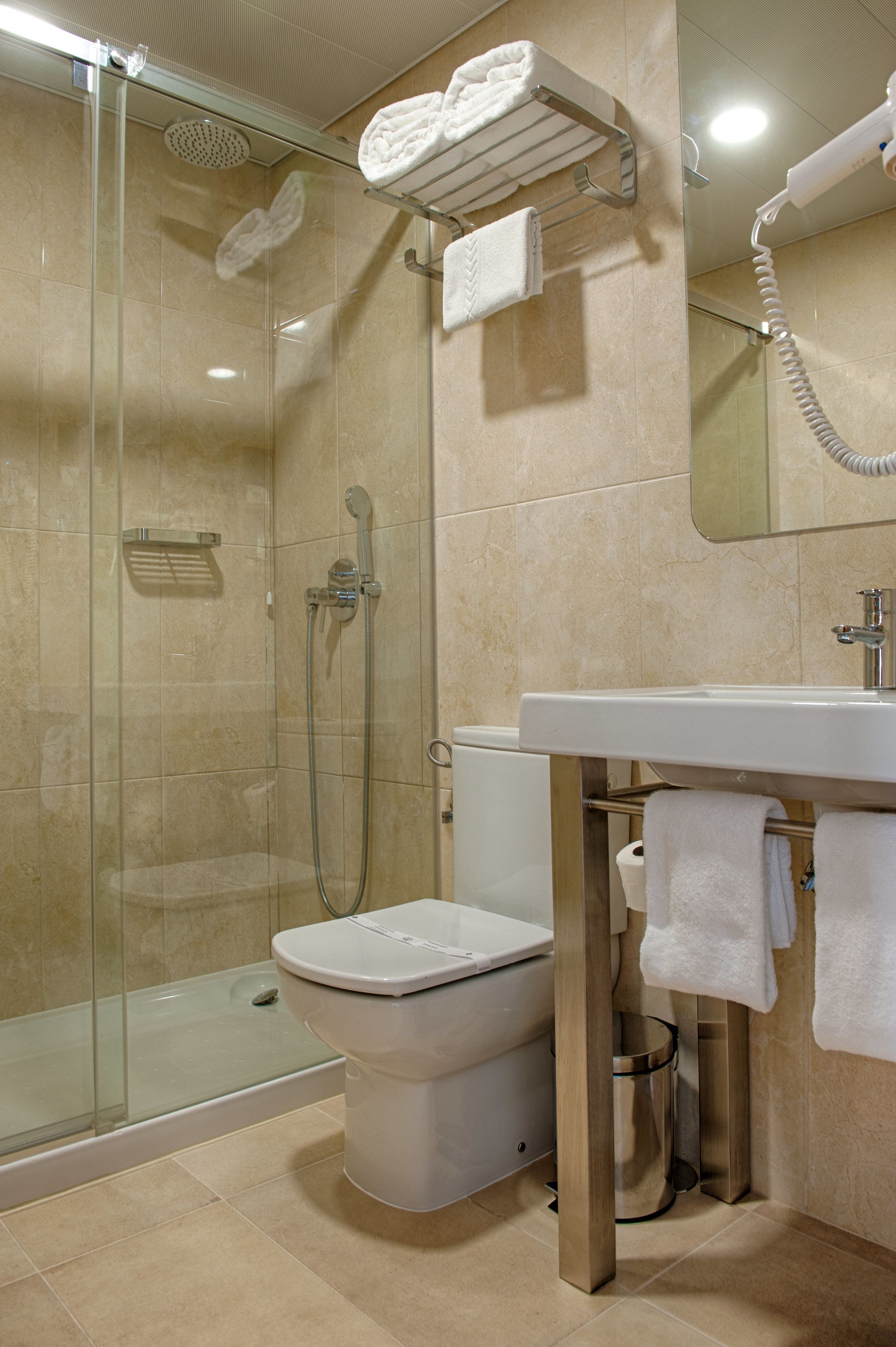 superior double room | bathroom | shower, hair dryer, towels