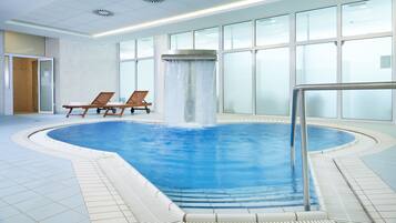 Indoor pool, open 7 AM to 9 PM, pool loungers