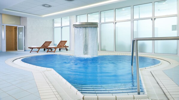 Indoor pool, open 7 AM to 9 PM, pool loungers