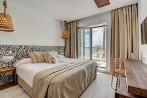 Habitació doble, vistes al mar | Matalassos amb encoixinament addicional i minibar 