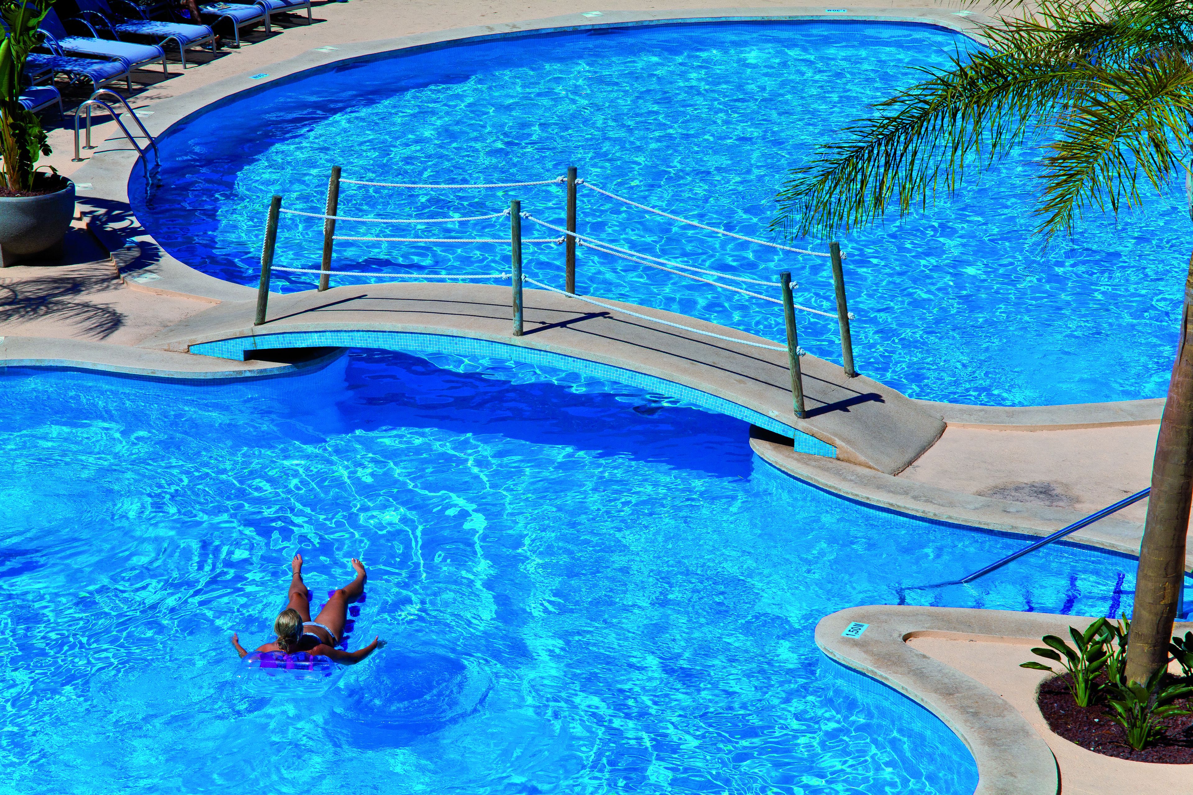 seasonal outdoor pool, pool umbrellas, pool loungers