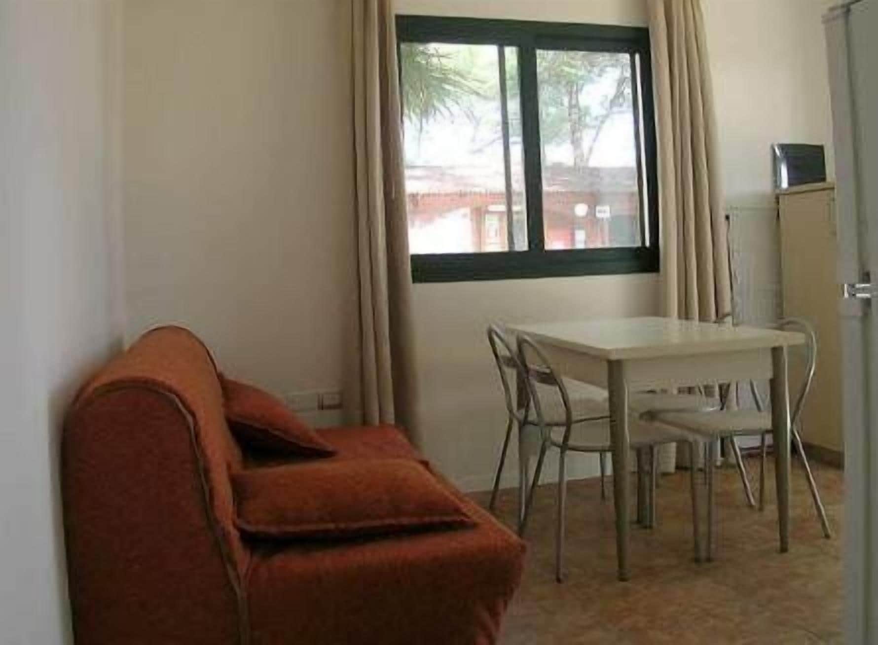 Apartment, 1 Bedroom, Patio | Living area | Flat-screen TV