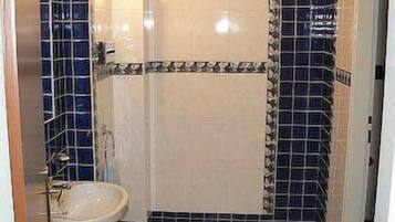 Shower, free toiletries, hair dryer