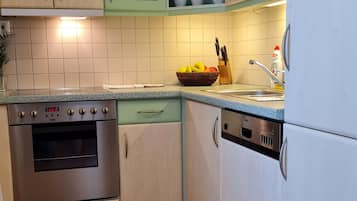 Appartamento Grand, 1 camera da letto, cucina | Cucina privata | Macchina per tè/caffè, bollitore elettrico