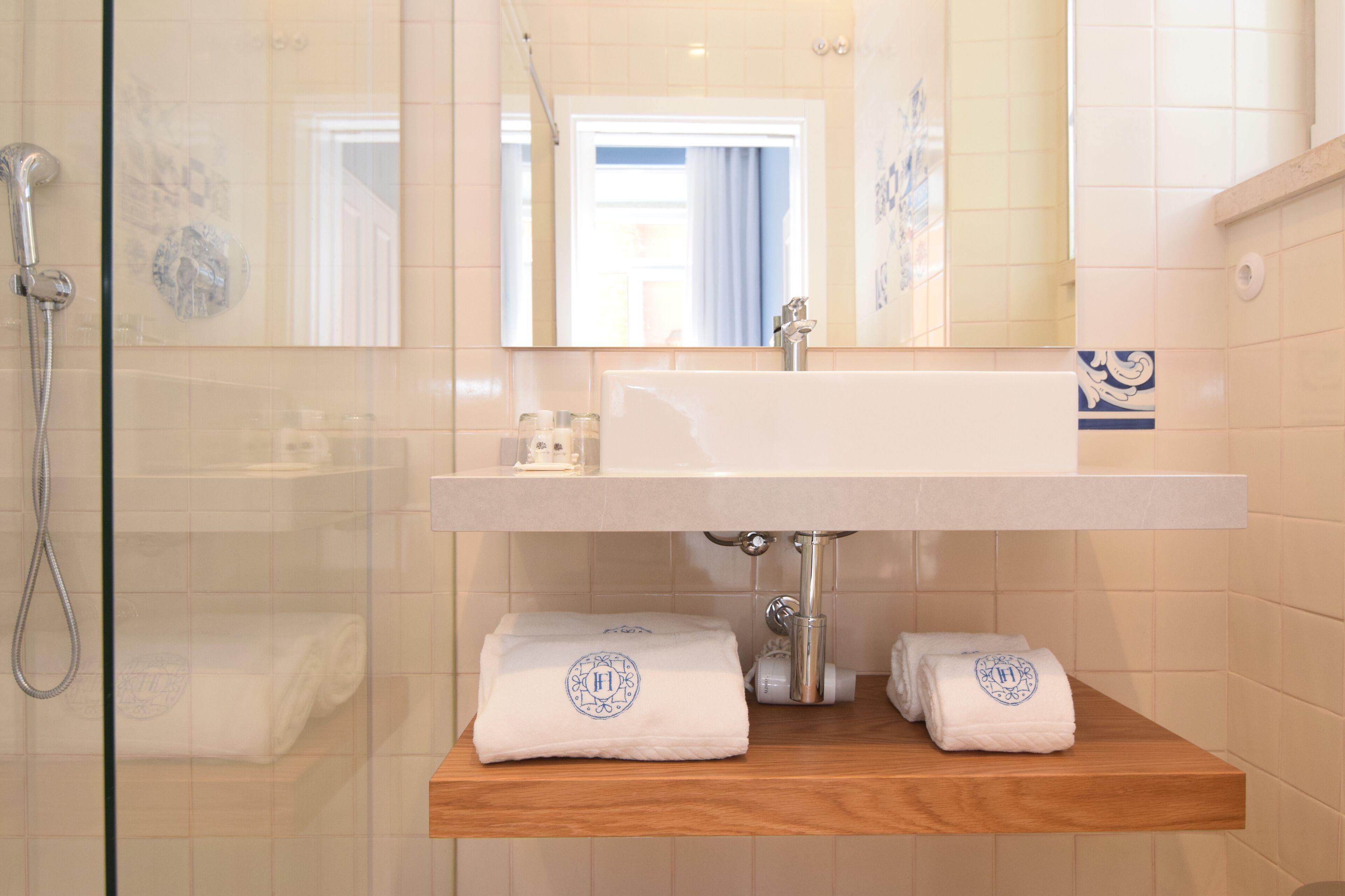 free toiletries, hair dryer, bidet, towels