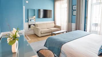 Habitación familiar (Deluxe) | Ropa de cama de alta calidad y caja de seguridad en la habitación