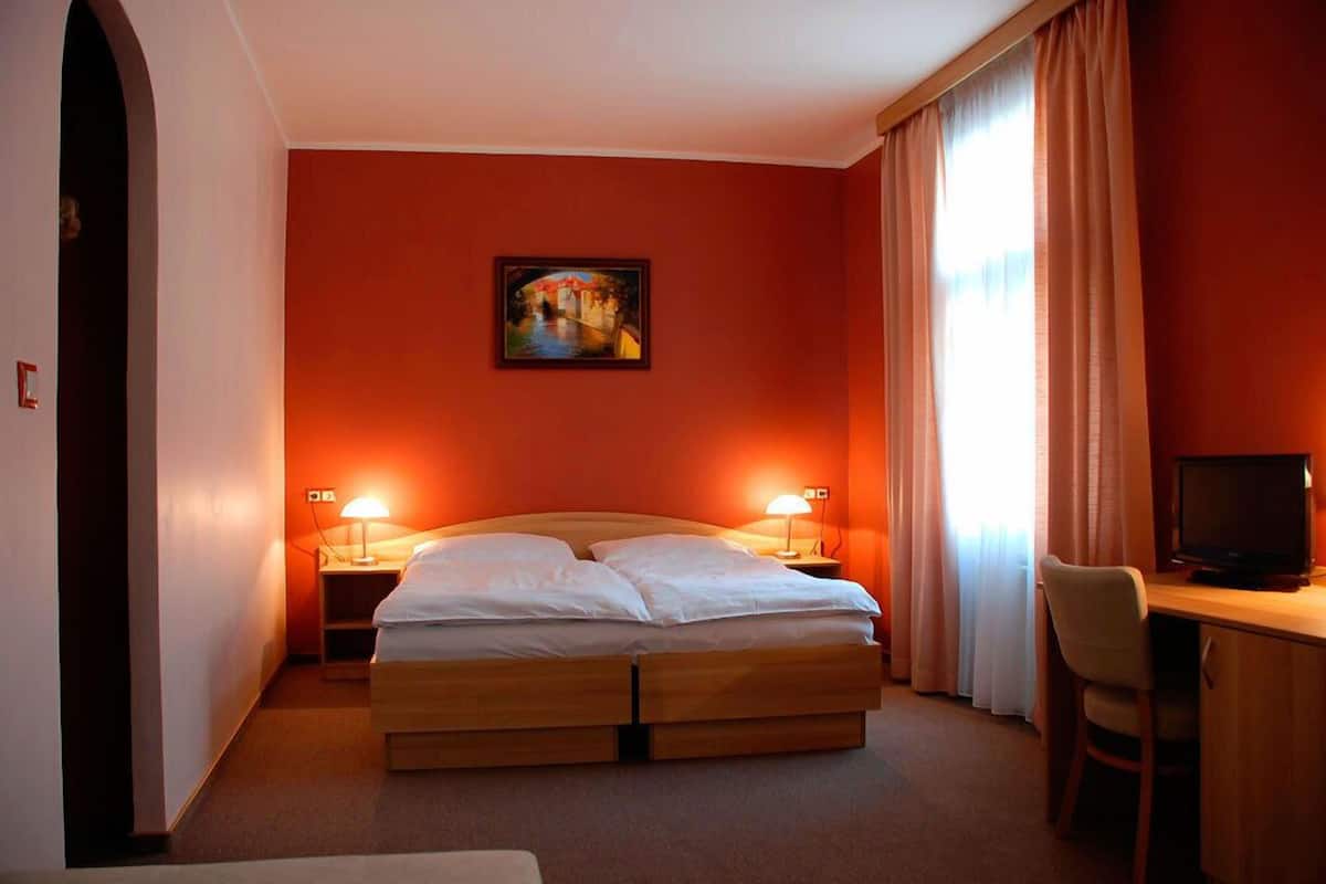 Standard Double or Twin Room | In-room safe, desk, iron/ironing board (on request), cribs (free)