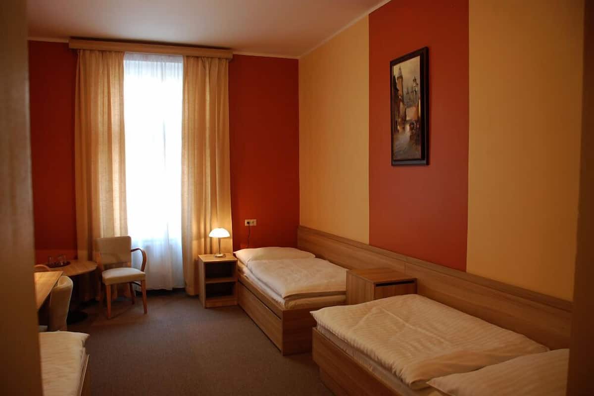 Triple Room | In-room safe, desk, iron/ironing board (on request), cribs (free)