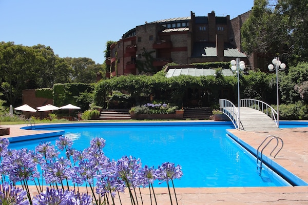 Indoor pool, seasonal outdoor pool, pool umbrellas, sun loungers