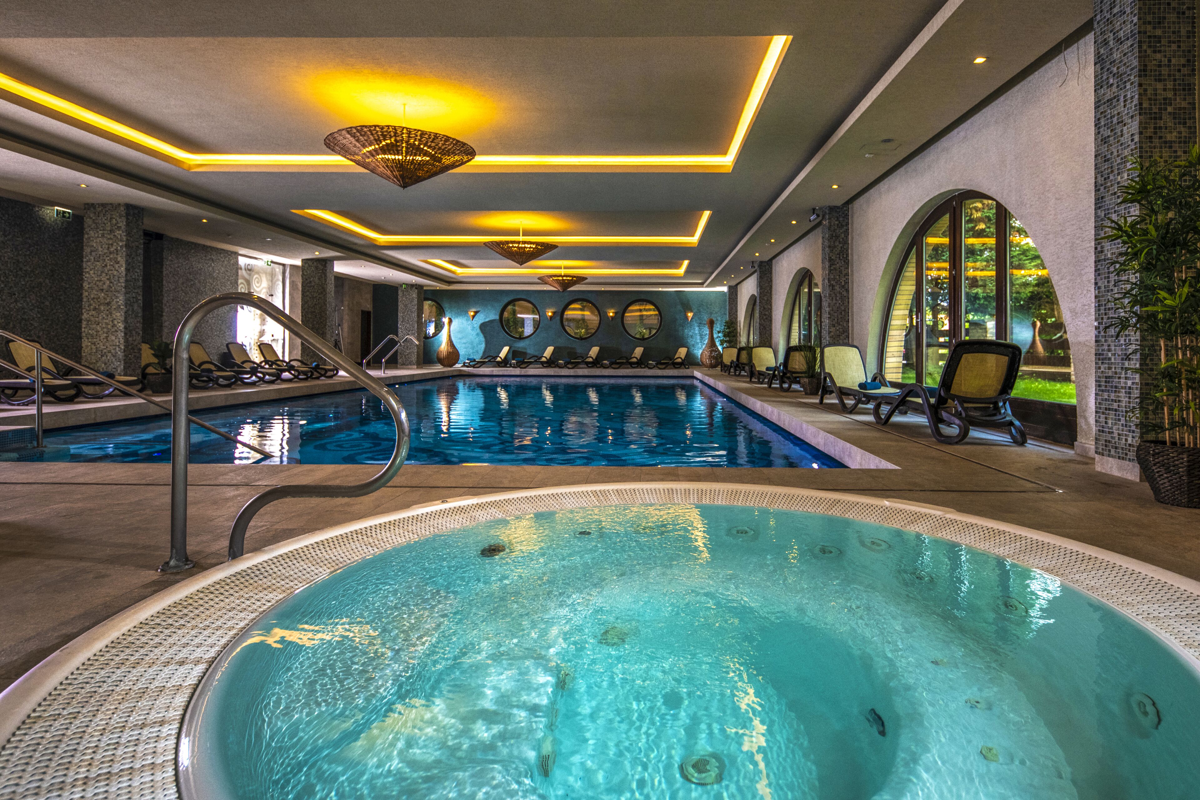 Indoor pool, open 6:00 AM to 9:00 PM, pool loungers