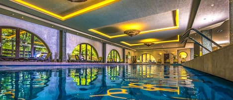 Indoor pool, open 6:00 AM to 9:00 PM, pool loungers