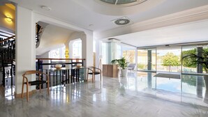 A spacious lobby with a marble floor, a reception desk, and a staircase. - Aluasun Continental Park Hotel & Apartments (Muro)