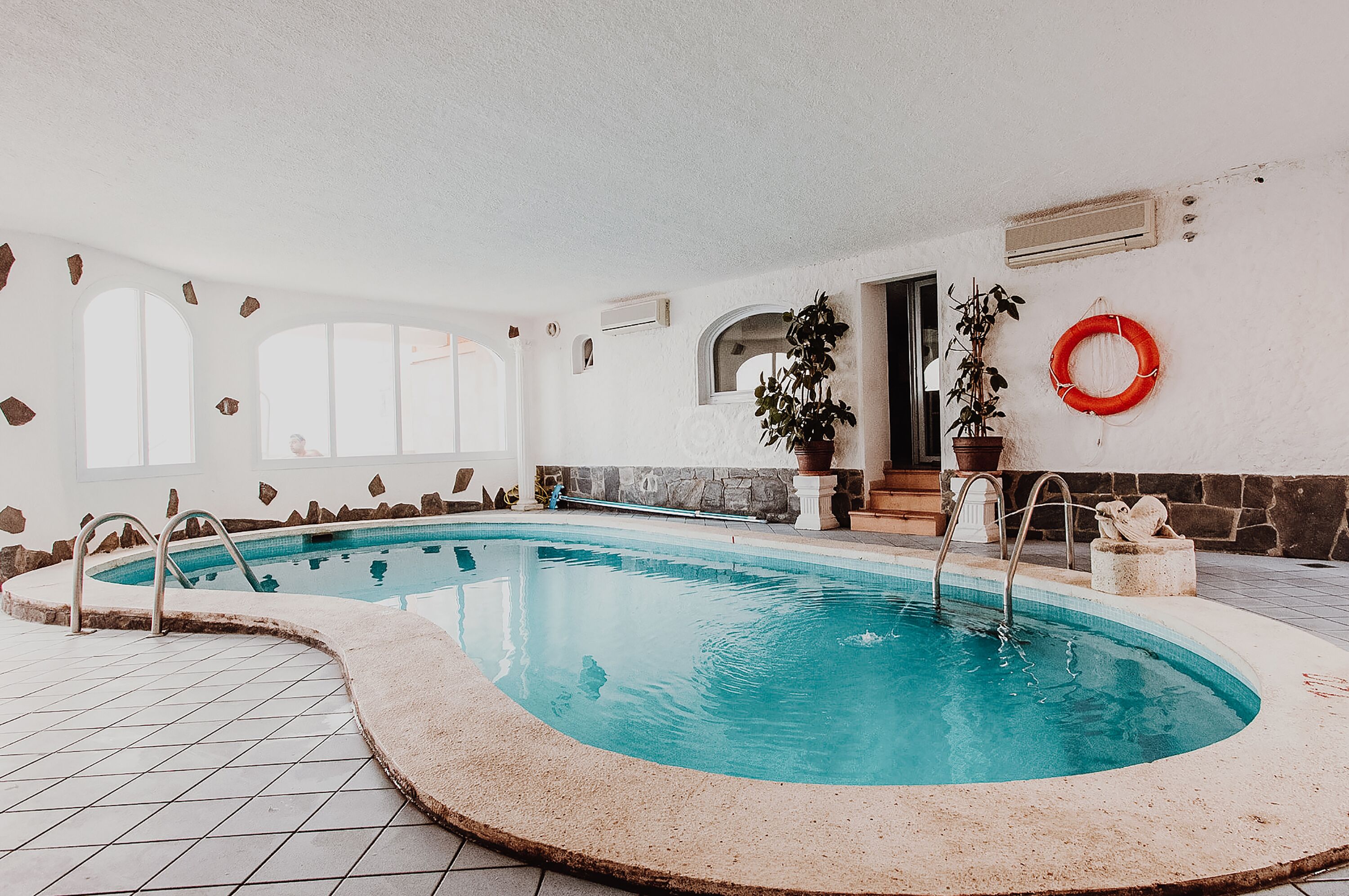 indoor pool, pool loungers