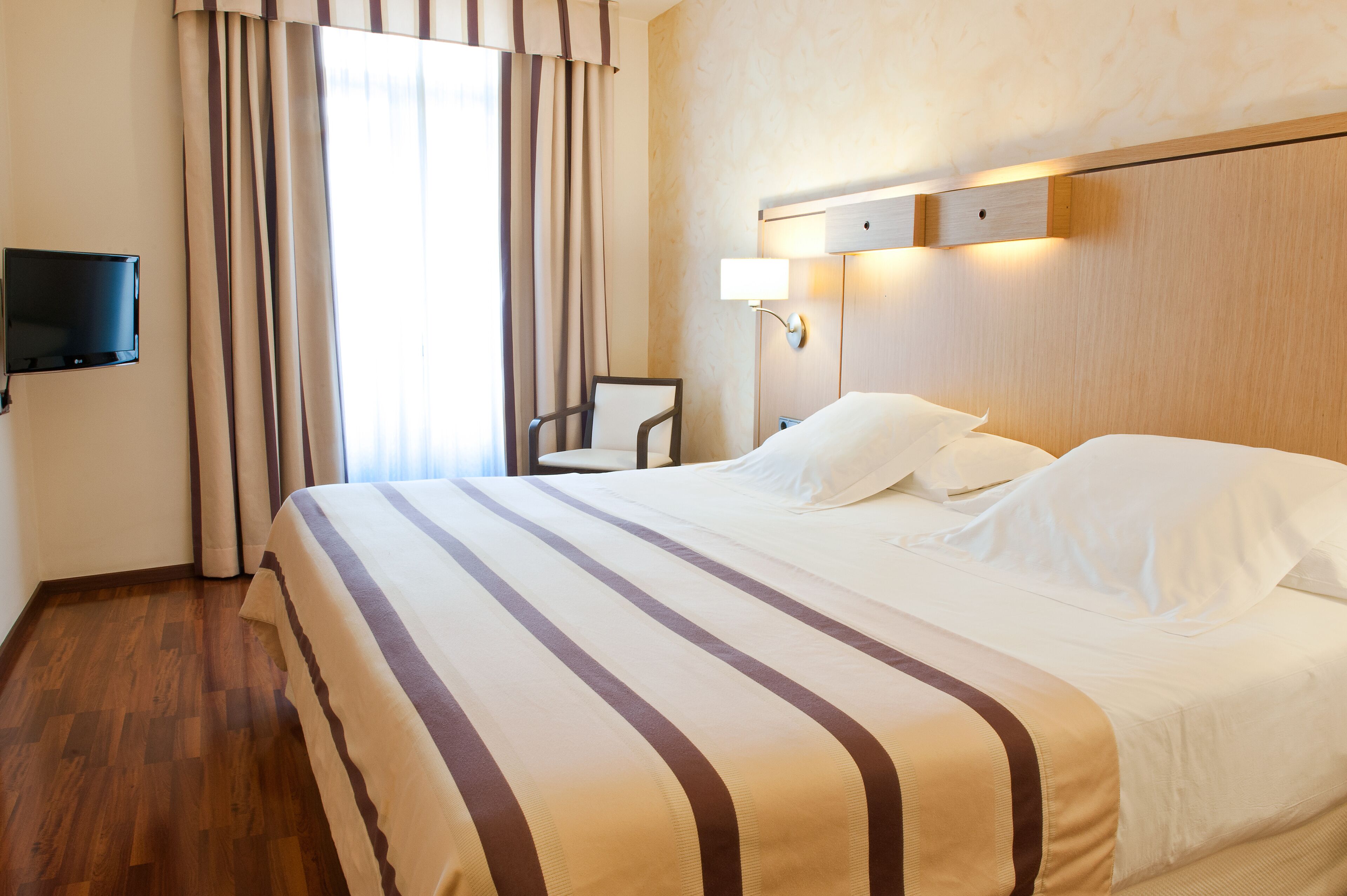 Premium bedding, down duvets, in-room safe, individually decorated