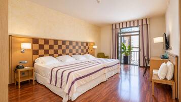 Exclusive Quadruple Room | Premium bedding, down duvets, in-room safe, desk