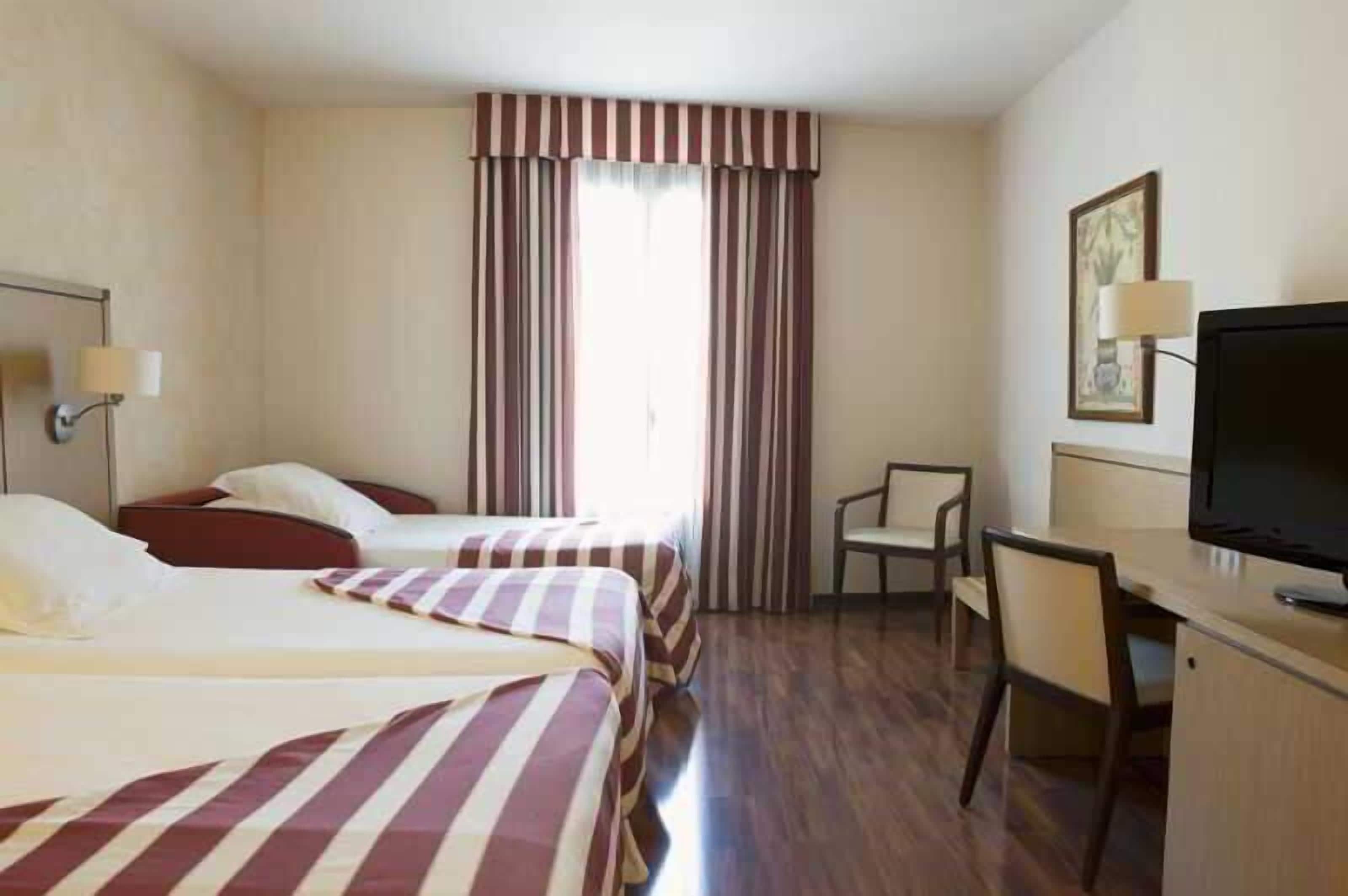 Premium bedding, down duvets, in-room safe, individually decorated