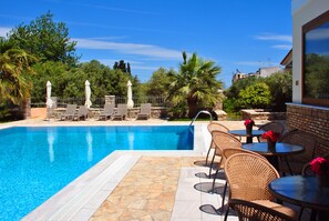 Outdoor pool, pool umbrellas, pool loungers