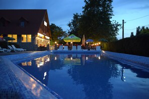 Seasonal outdoor pool, pool loungers