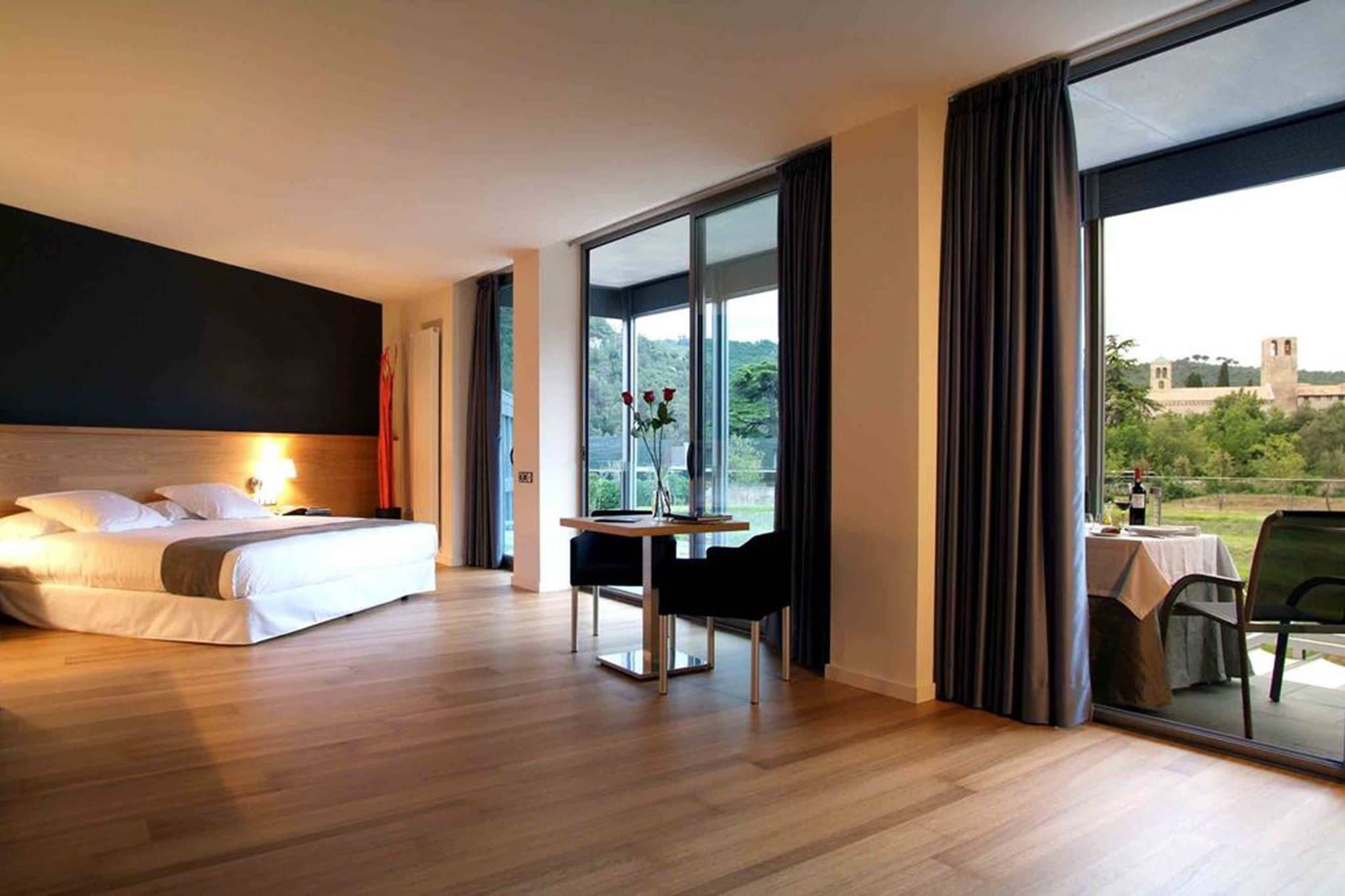 junior suite, terrace | in-room safe, desk, soundproofing, iron/ironing board