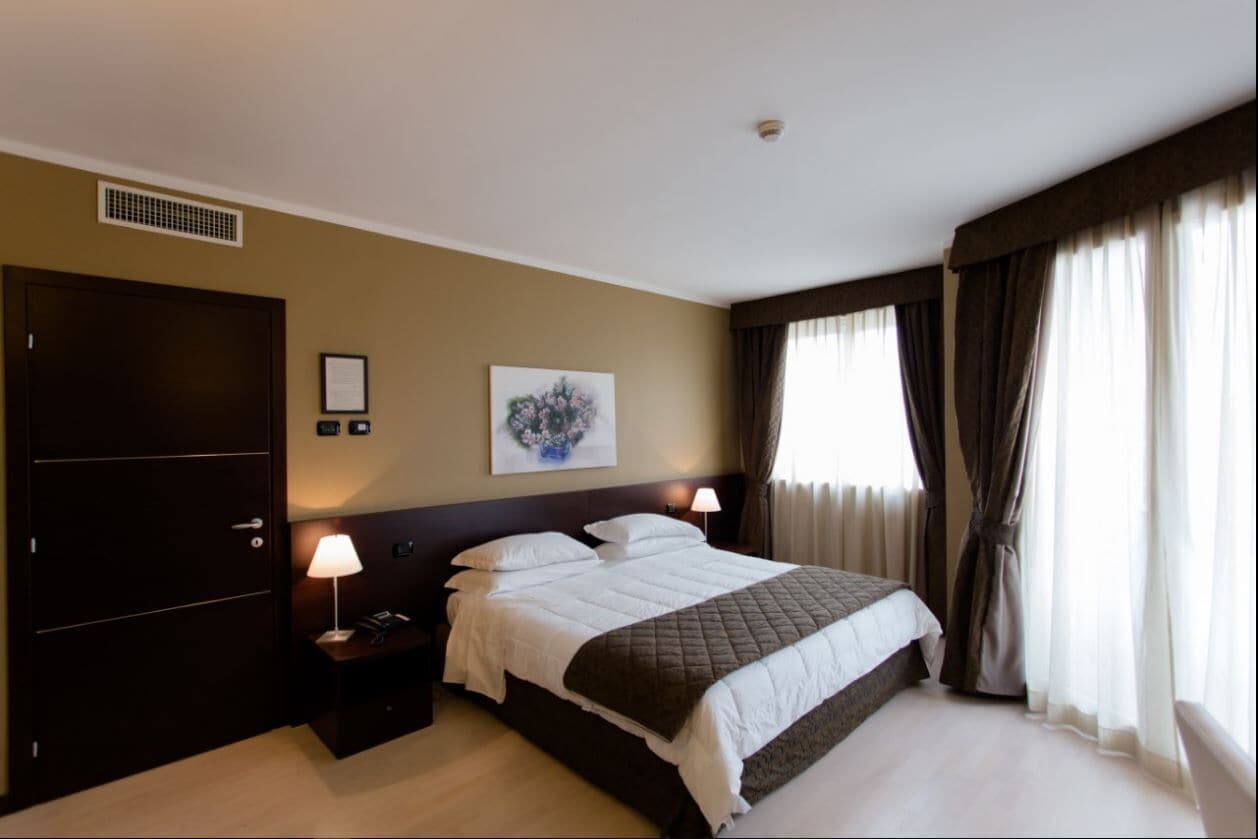 frette italian sheets, premium bedding, down duvets, memory-foam beds