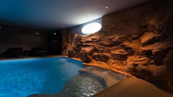 Indoor pool, open 4:00 PM to 9:00 PM, pool loungers