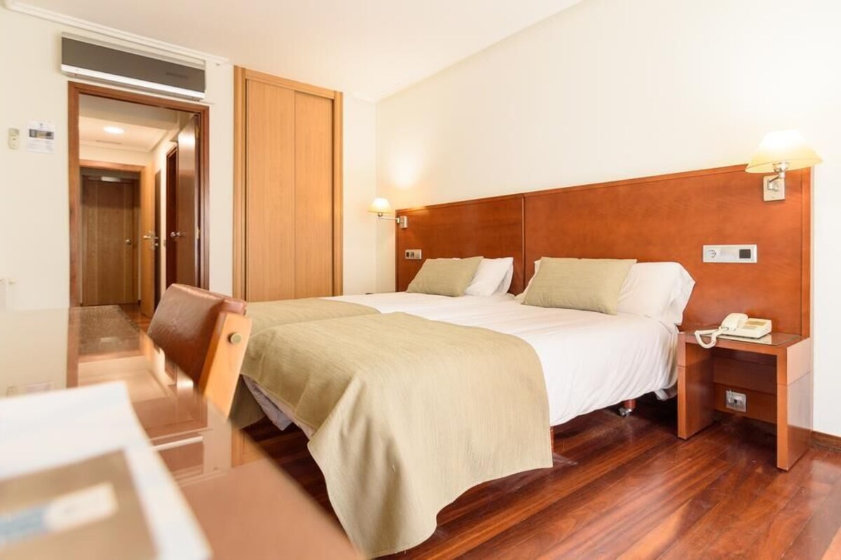 In-room safe, desk, WiFi (free), bed sheets