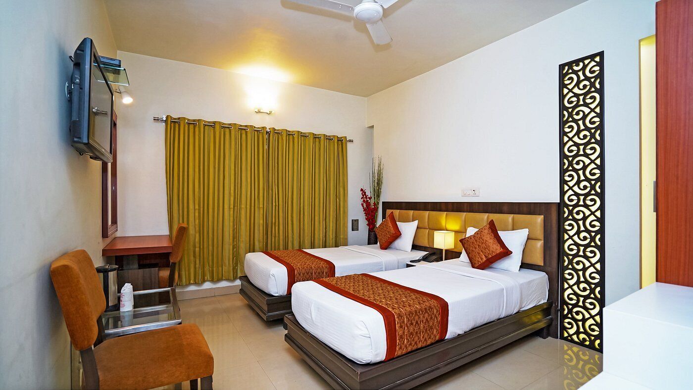 Deluxe Room, Multiple Beds | Premium bedding, minibar, in-room safe, desk