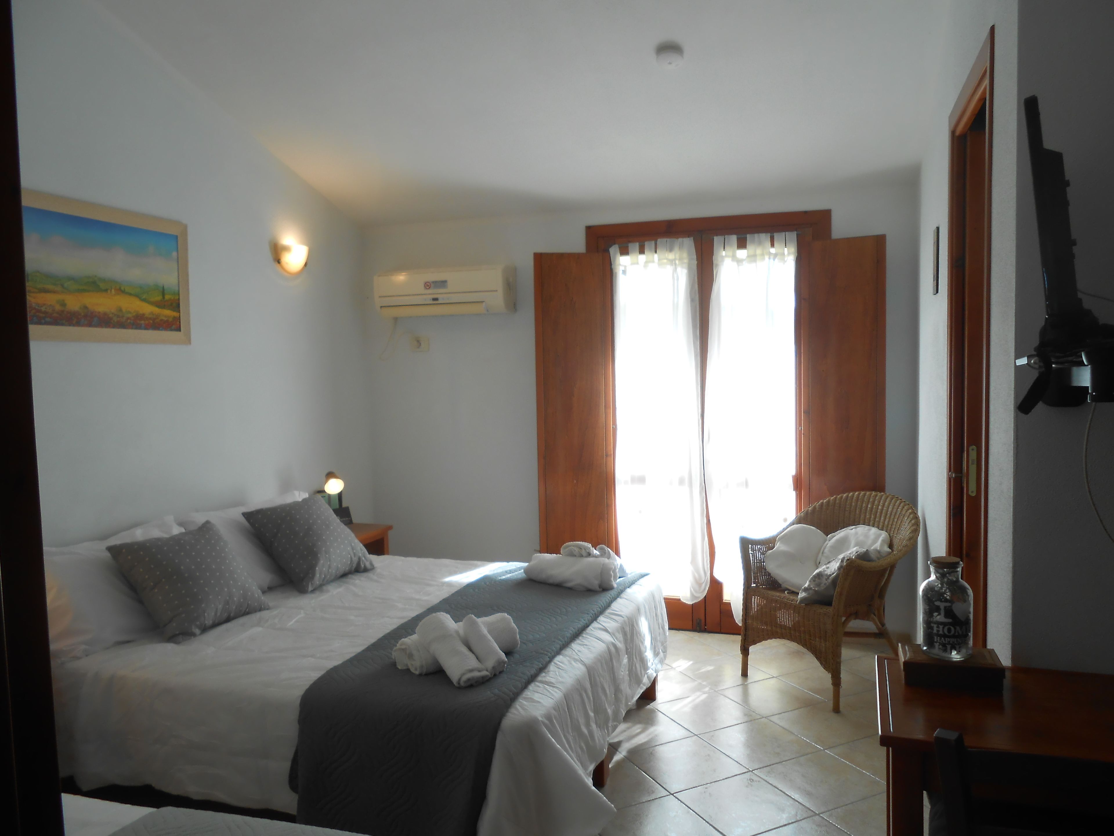 triple room, garden view | 1 bedroom, hypo-allergenic bedding, in-room safe, individually decorated