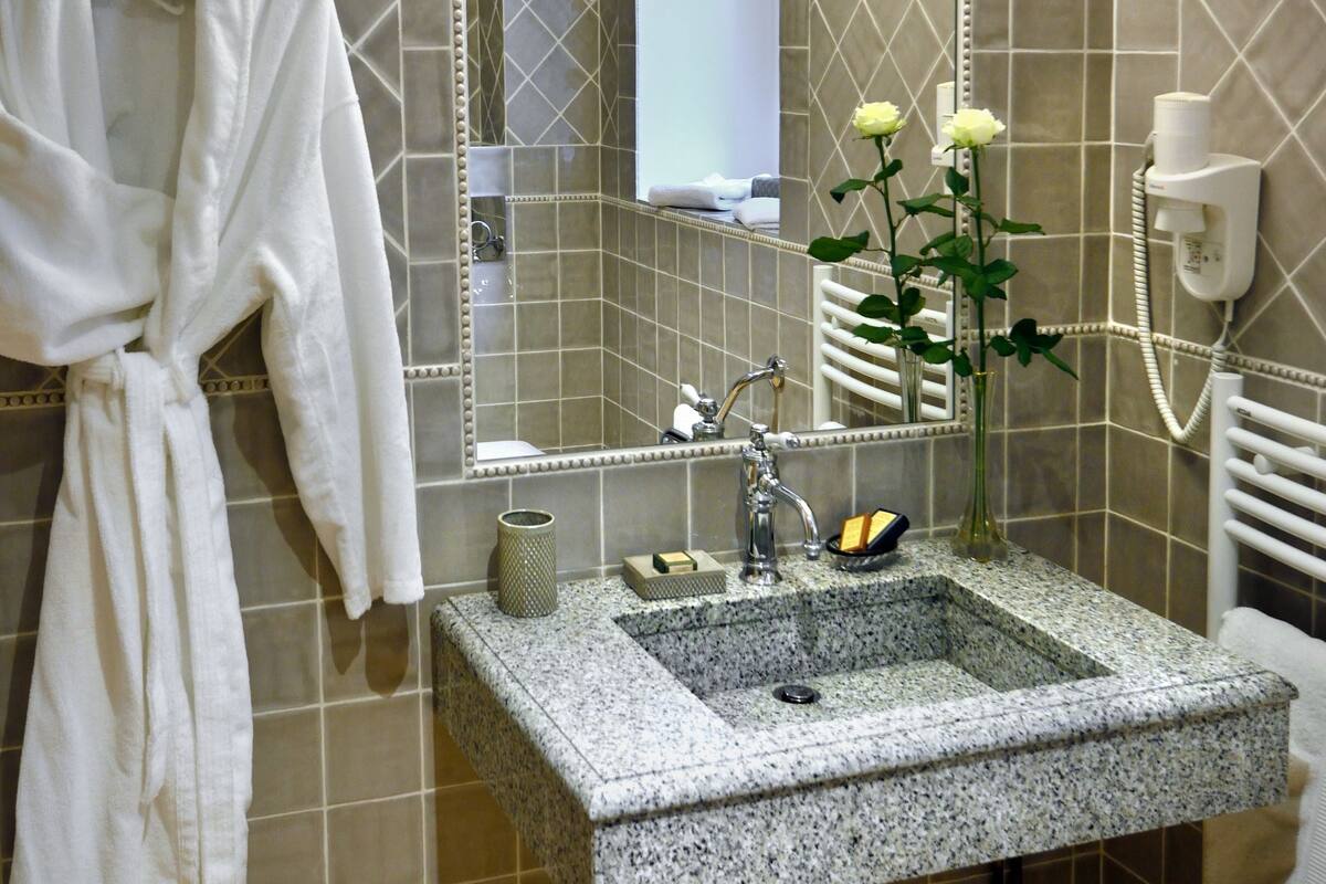 comfort room (in d'artagan house) | bathroom | free toiletries, hair dryer, bathrobes, slippers