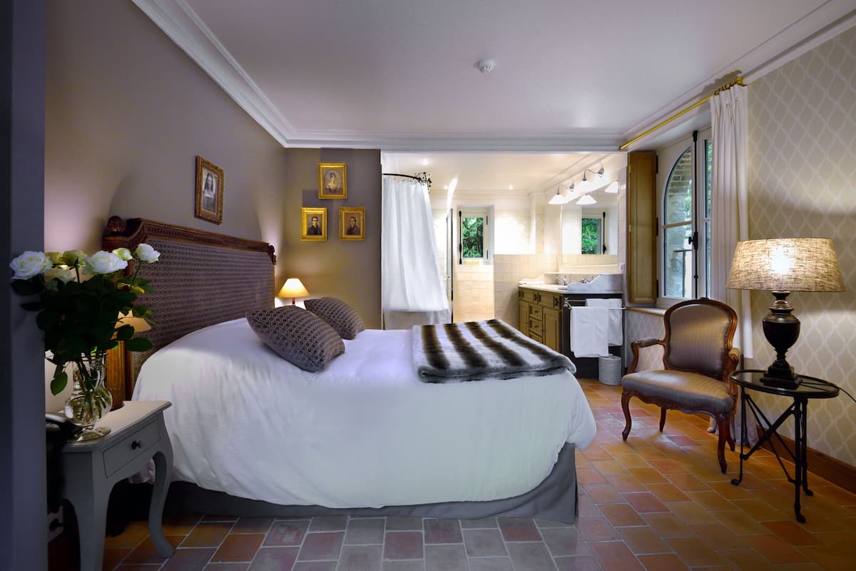 comfort room (in d'artagan house) | premium bedding, in-room safe, individually decorated
