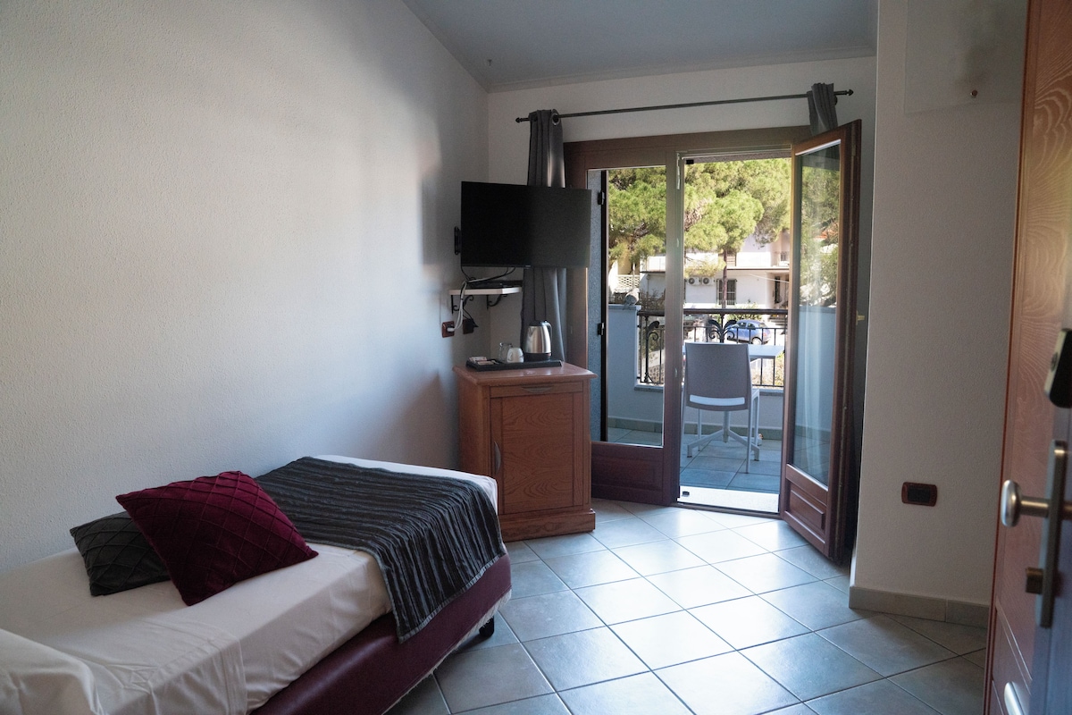 Single Room | Minibar, in-room safe, blackout drapes, iron/ironing board (on request)