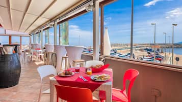 Breakfast, lunch, dinner served; Mediterranean cuisine, ocean views