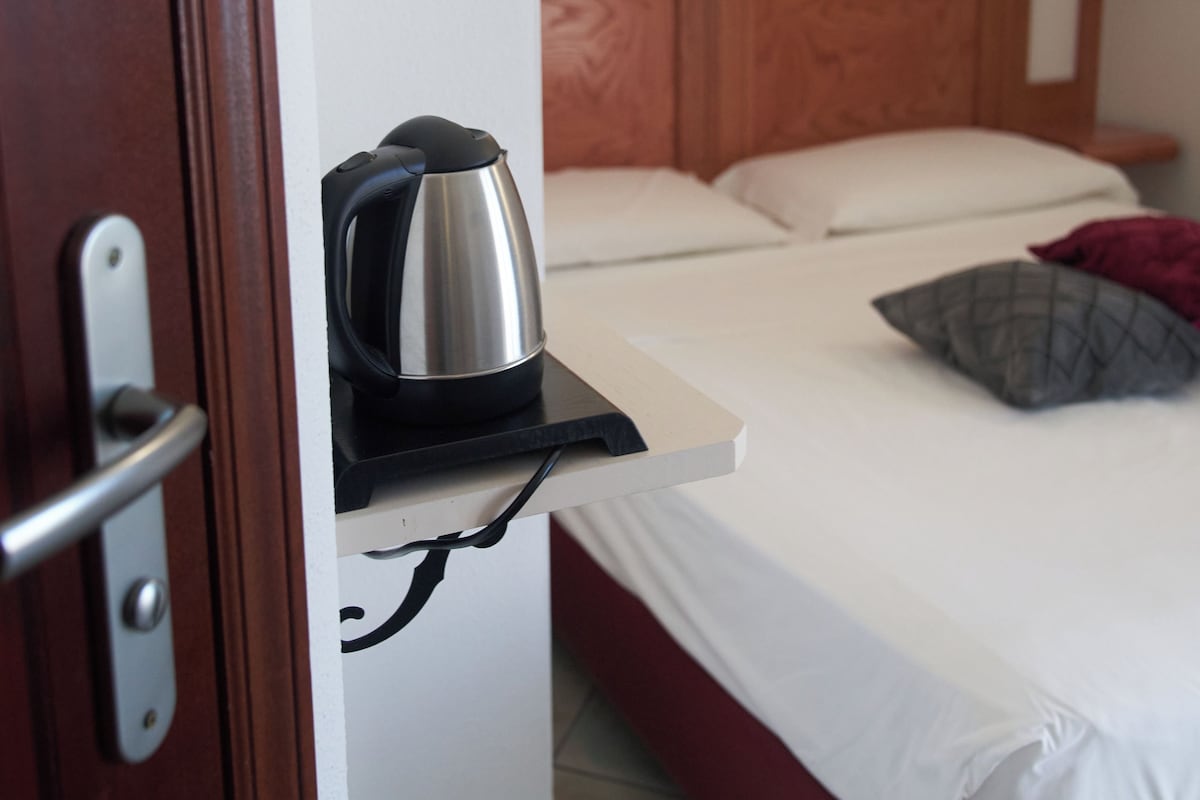 Double Room | Minibar, in-room safe, blackout drapes, iron/ironing board (on request)