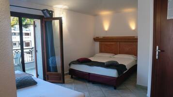 Comfort Triple Room | Minibar, in-room safe, blackout drapes, iron/ironing board (on request)
