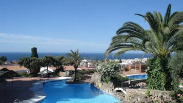 5 outdoor pools, pool umbrellas