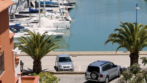 A marina with numerous boats docked. - Apartamentos Puerto Sherry (El Puerto de Santa Maria)