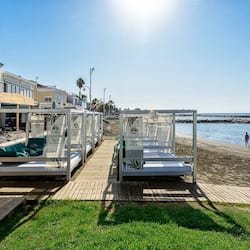 On the beach, sun loungers, beach umbrellas