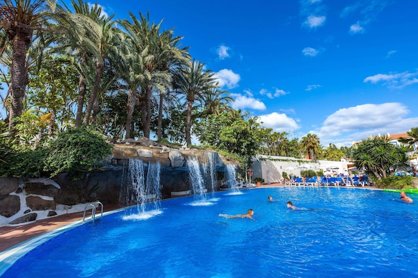 Outdoor pool, pool umbrellas, pool loungers