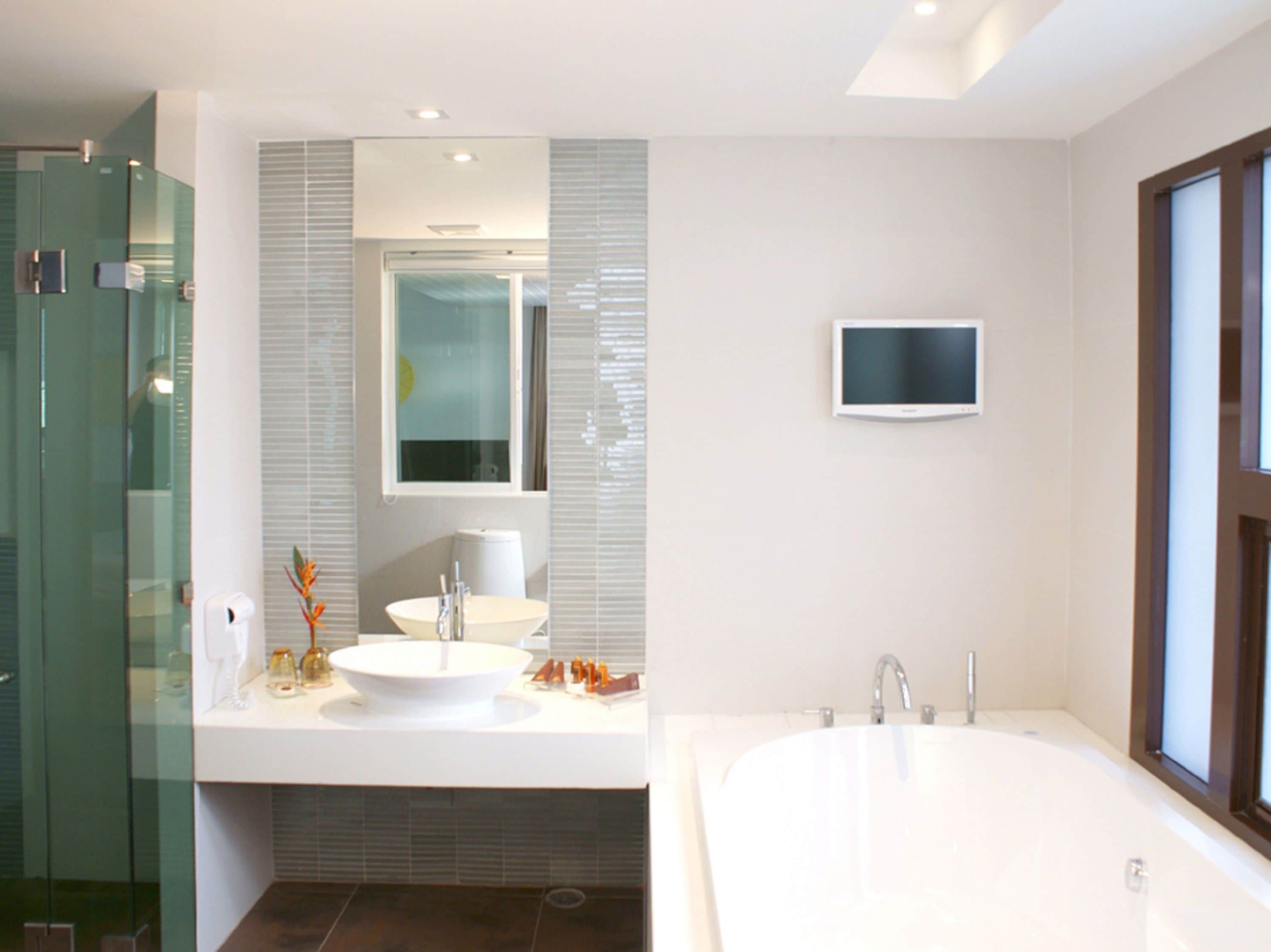 separate bathtub and shower, free toiletries, bathrobes, slippers