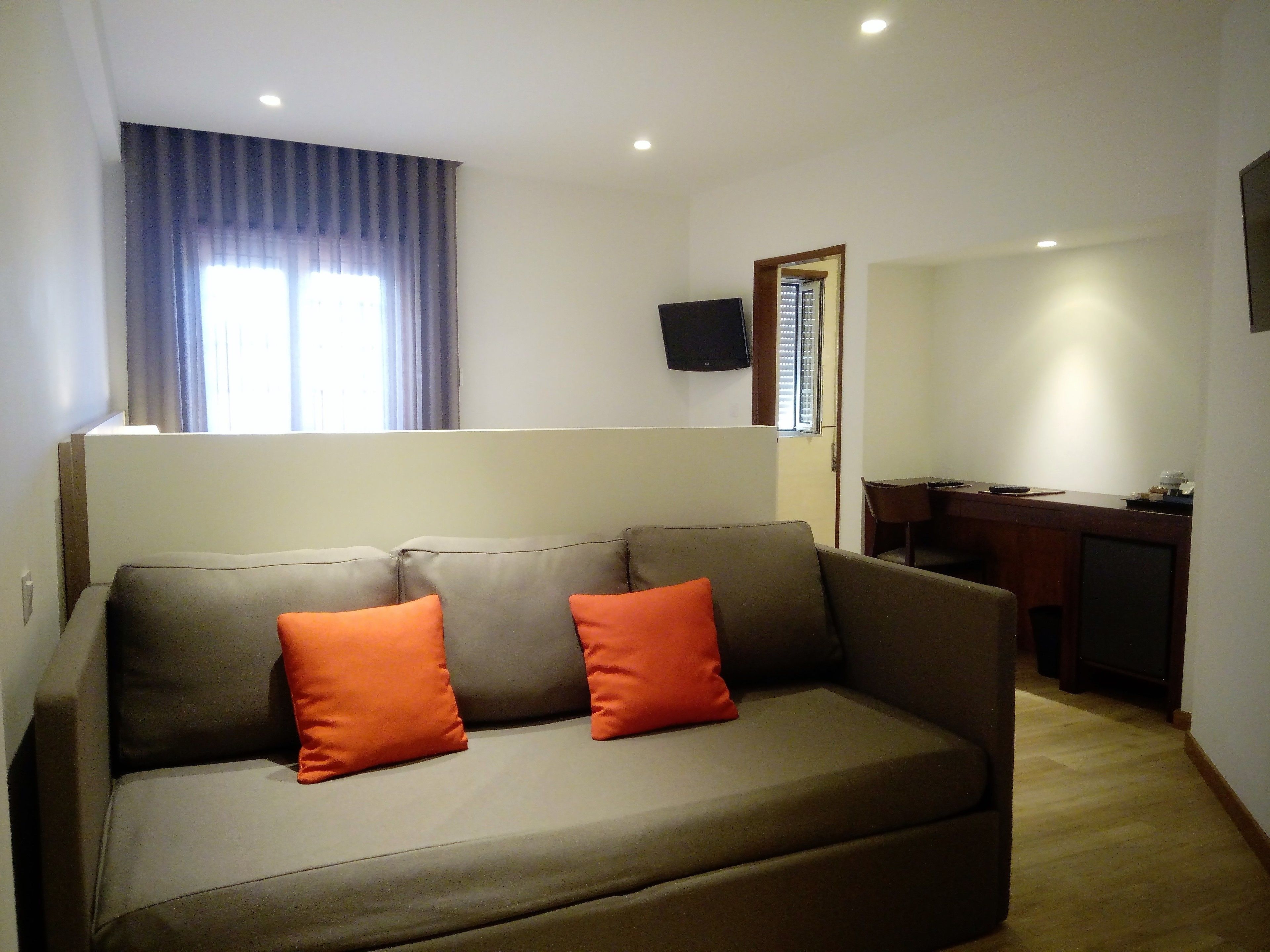 junior suite | in-room safe, desk, blackout curtains, soundproofing