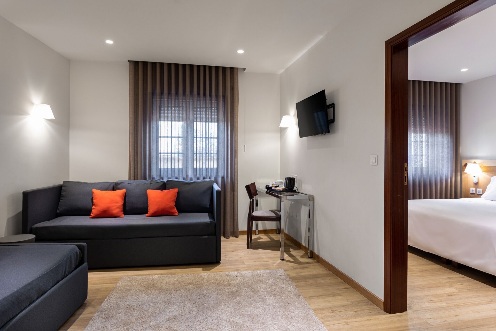 suite | in-room safe, desk, blackout curtains, soundproofing