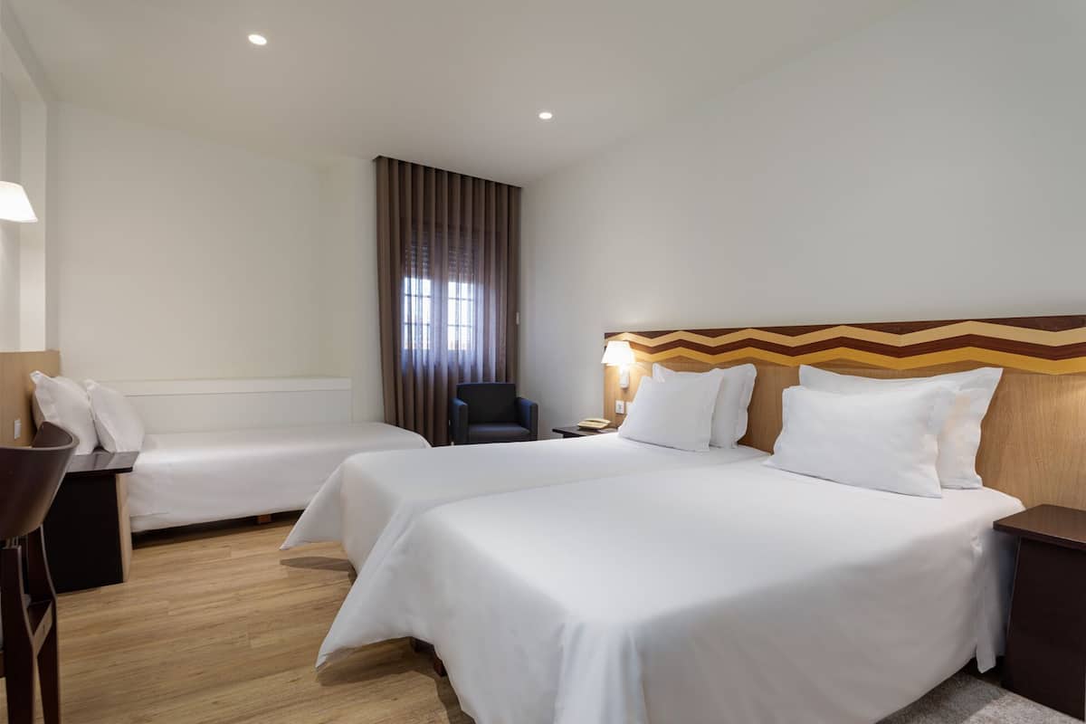 Triple Room | In-room safe, desk, blackout curtains, soundproofing