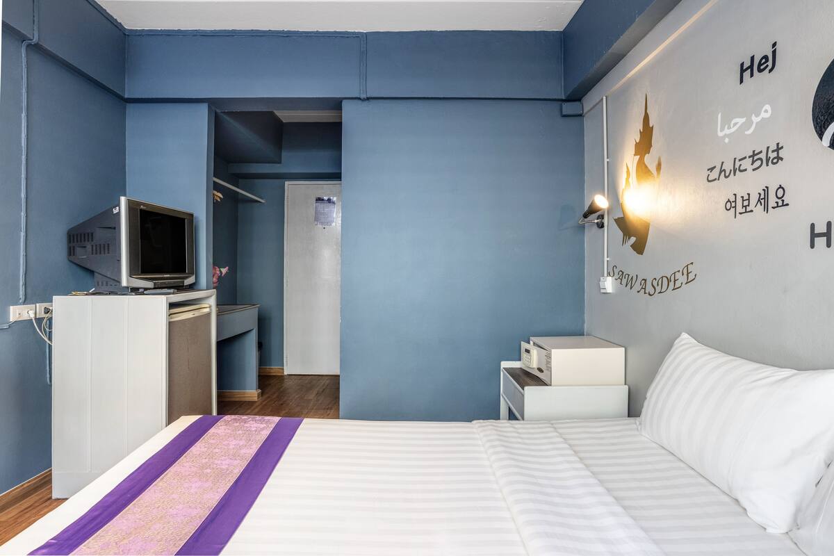 Standard Premier | Cortinas blackout, camas extra, wifi gratis y ropa de cama