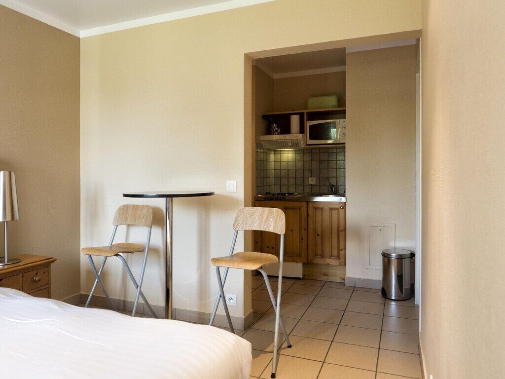 Premium bedding, down duvets, laptop workspace, blackout curtains