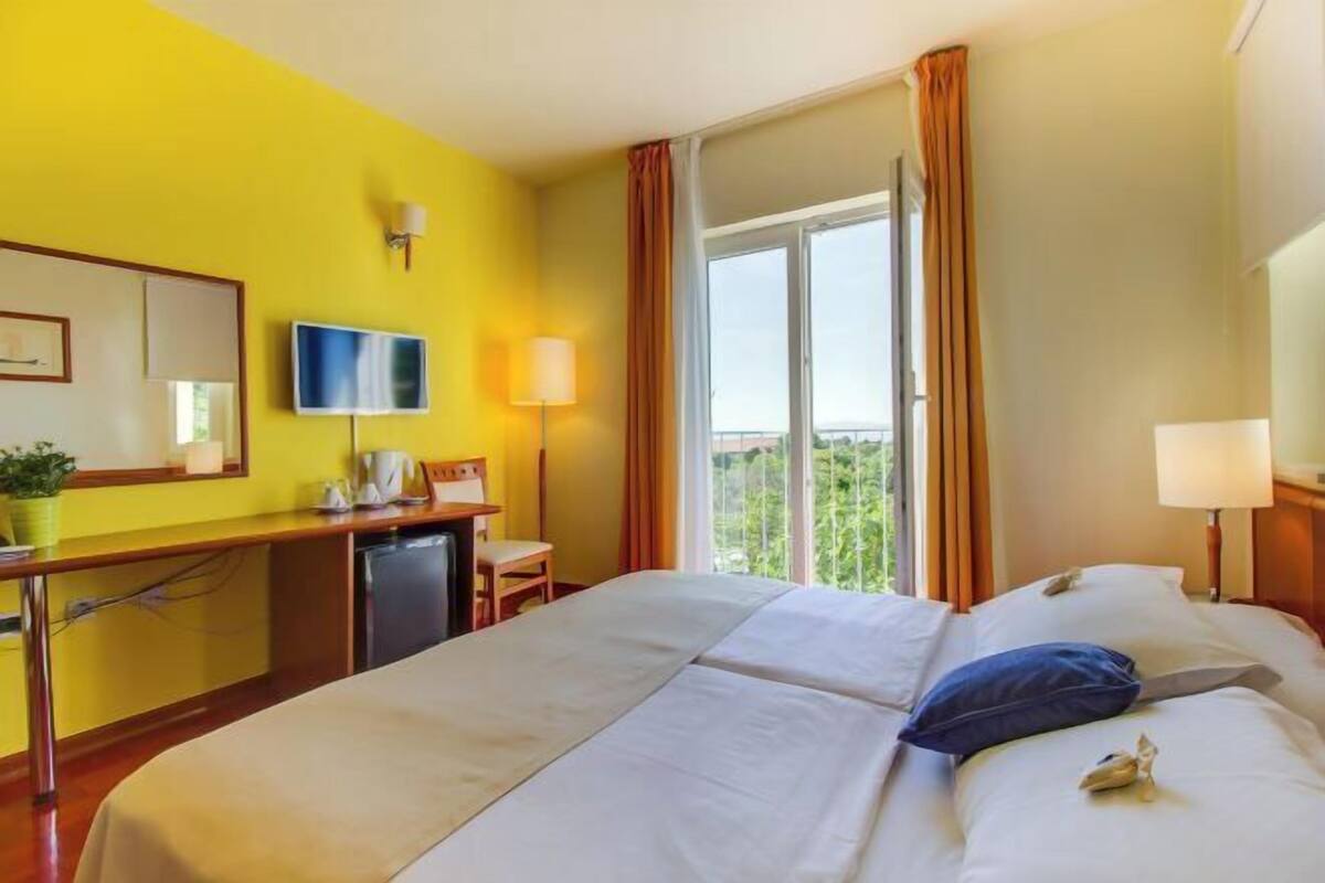 2 quartos, roupas de cama premium, edredons de pluma