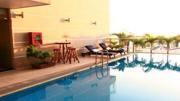Outdoor pool, sun loungers